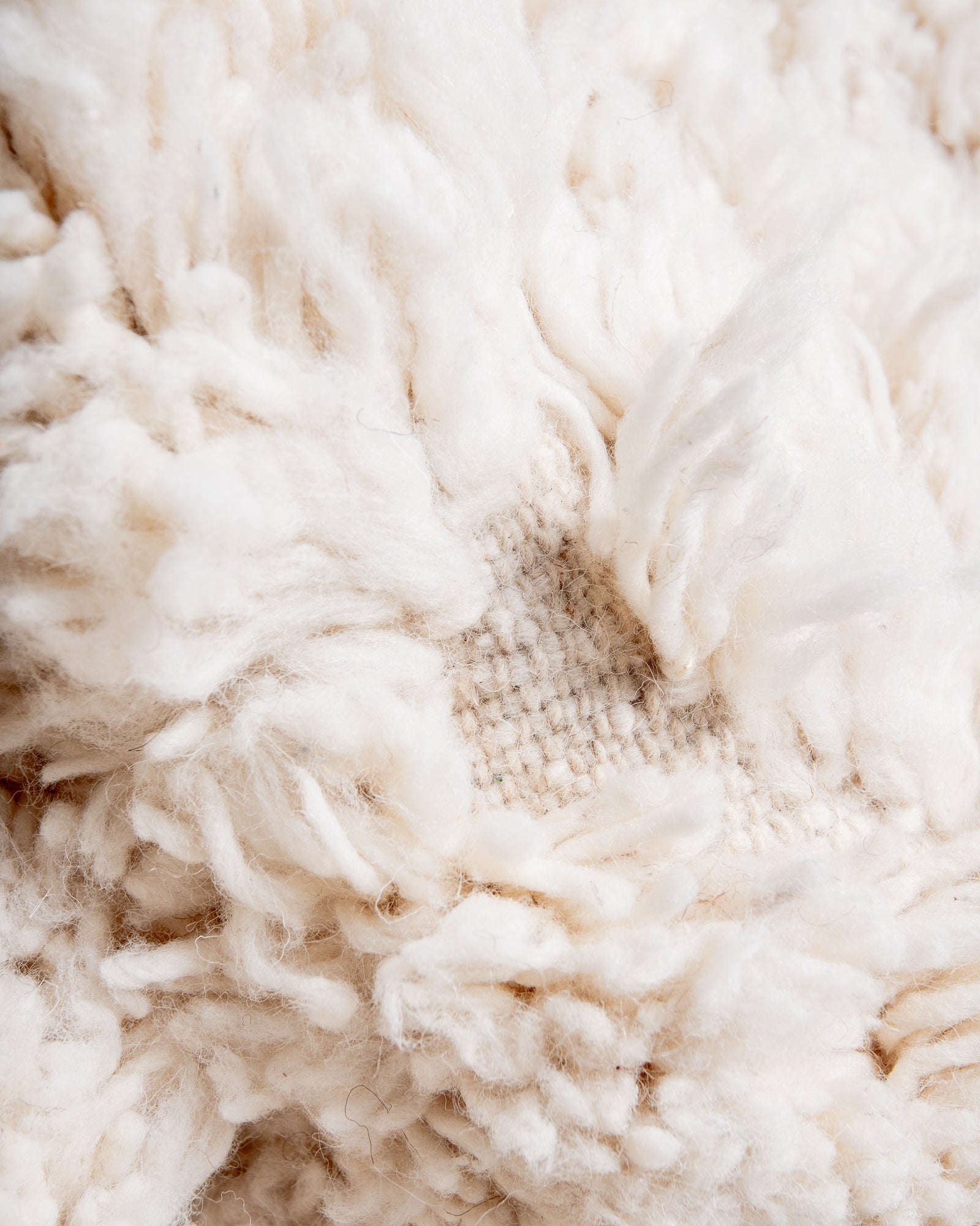 Modern, designer, handcrafted Berber rug from Morocco. Beniourain carpet with beautiful colours and patterns and fluffy wool texture.